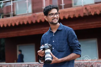 Omkar Dhatkar with his camera outside the studio